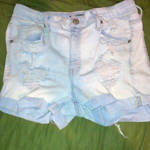 these are light blue aéropostale ripped jean shorts. they have been worn a few.